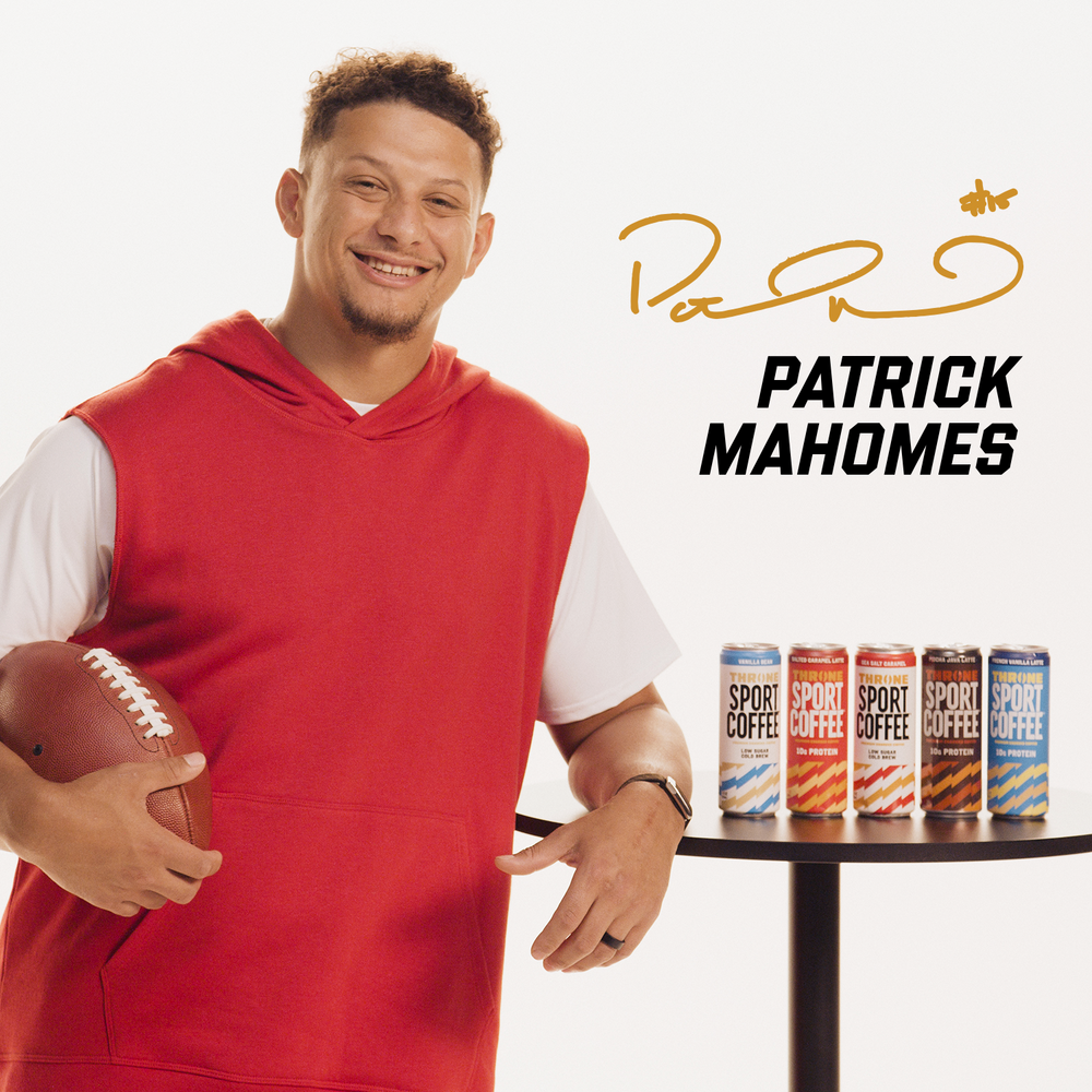 Patrick Mahomes smiles, holding a football and standing next to a table with six cans from the Cold Brew Variety 6-Pack—featuring delicious dairy free Premium Charged Cold Brew options. His name and signature appear in bold text beside him on a white background, spotlighting this refreshing cold brew assortment.